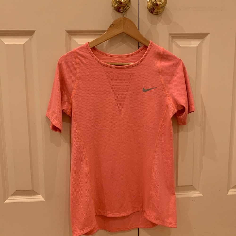 Nike short sleeve orange top. Size Medium